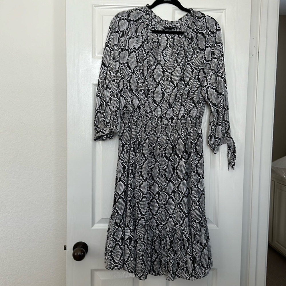 Snake skin patterned midi dress in black white and gray.